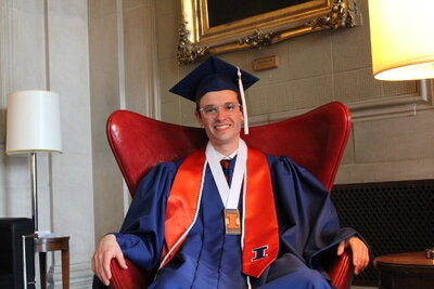 Charlie Maschak headshot in UIUC cap and gown